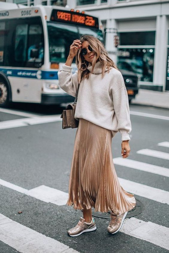 pleated midi skirt and trainers